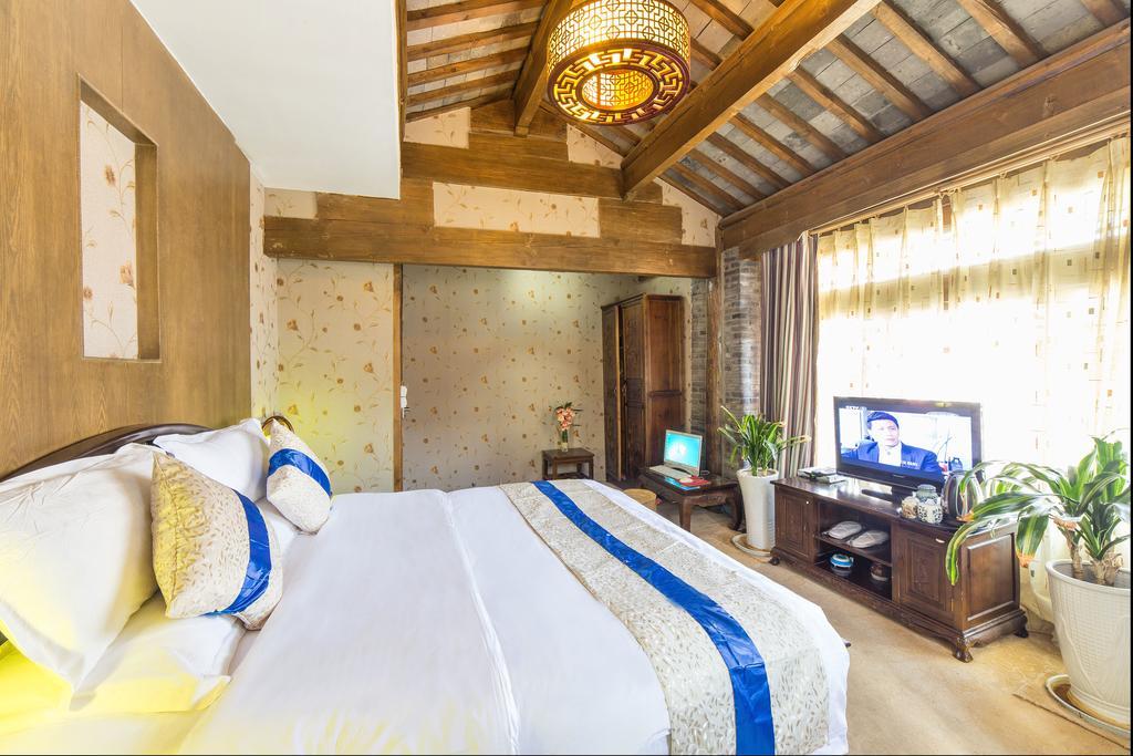 Yi Liu Hostel Licsiang Szoba fotó