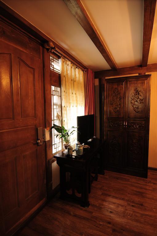 Yi Liu Hostel Licsiang Szoba fotó